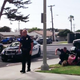 Video footage appears to show officers pinning Cindy Hahn (in pink) to the ground, while one can be seen punching her repeatedly in the head during a 2013 arrest in Carlsbad, Calif.
CBS Los Angeles Screenshot